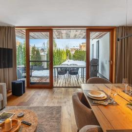 Modern garden apartment with sauna near ski lift, отель в городе Feuring