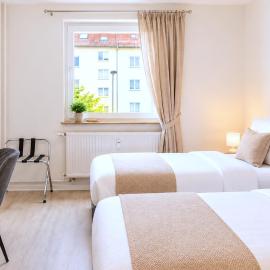 Gemütliches Apartment für 6 Personen mit Balkon, Wifi, Smart-TVs