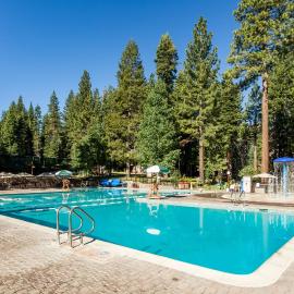 Cozy mountain condo with shared pool & hot tub access balcony and skiing nearby
