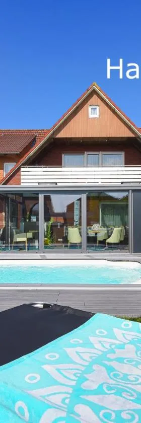 Ferienwohnung Haus zum Seehund mit Pool und Frühstücksoption, Hotel in Bensersiel