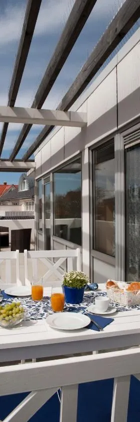 Lichtdurchflutete Ferienwohnung mit Südbalkon, Hotel in Wangerooge