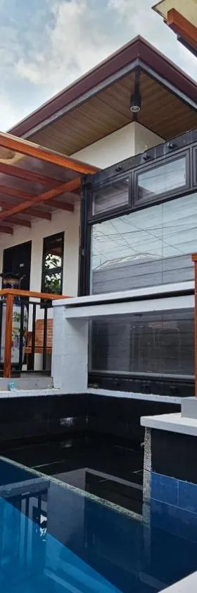 Jolie Joe's Bed and Breakfast with Shared Bathroom, Hotel in Tagudin