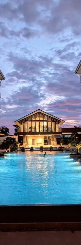 Near Airport Luxury on a Budget Gym, Pool, 55 Smart TV, Balcony facing amenities, Hotel in Pusok