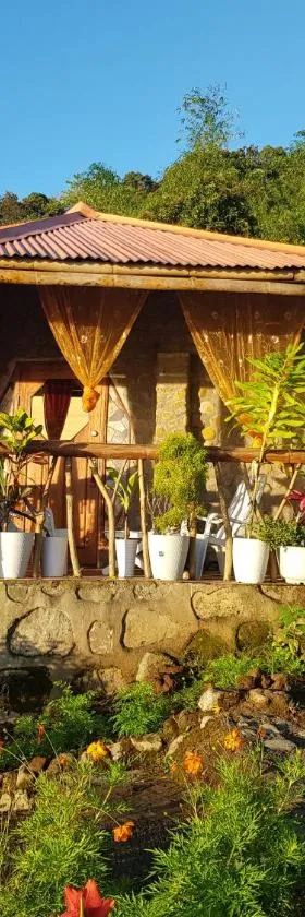 Eco Farm Romantic Stone House with STARLINK internet 700 meters above sea level, Hotel in Mambajao