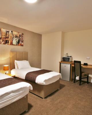 New County Hotel & Serviced Apartments by RoomsBooked