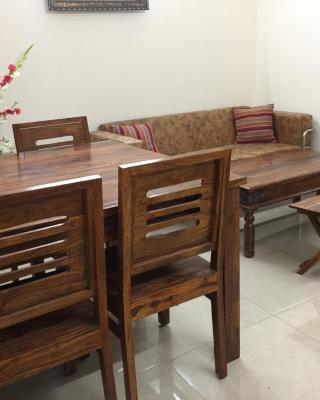 The Raveesh E24 - 2BHK Serviced Apartment