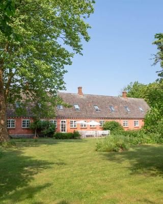 Mellem-rummet Guesthouse & Glamping