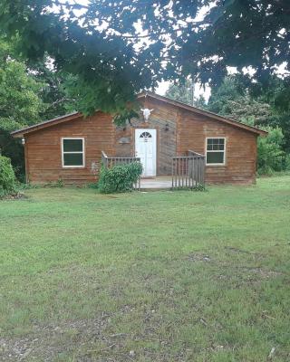 Cedar cabin located on a buffalo farm