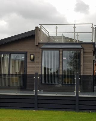 Hot tub hols in lodge with roof terrace