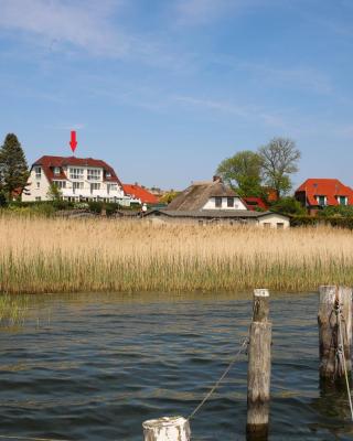 Ferienhaus Südblick am Meer in Breege mit Meerblick von allen drei Etagen sowie Sauna und Parkplatz