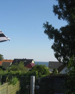Uns Gartenhus mit Blick auf das Meer