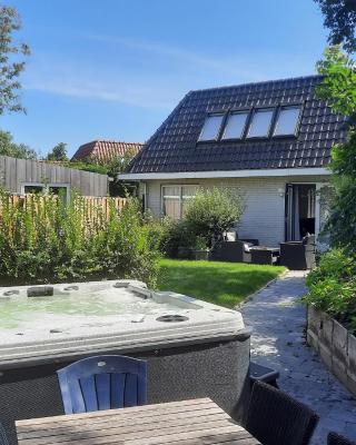 Holiday Home de witte raaf with garden and hottub