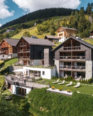 Les Dolomites Mountain Lodges