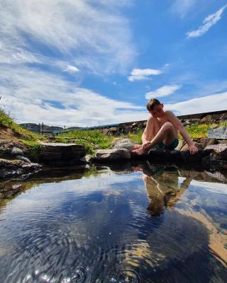 Hótel Laugarhóll with natural hot spring