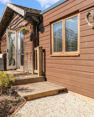 Woodmancote Lodge