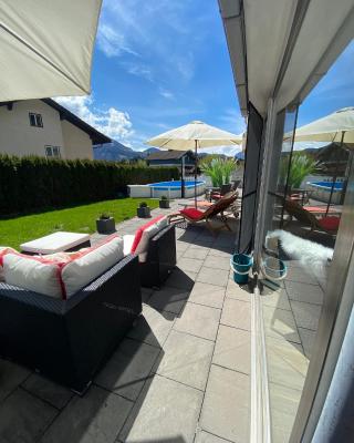 Modernes Alpenapartment mit Sauna Wintergarten und Pool