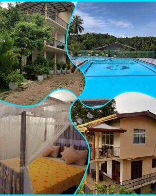 Coral Palm Villa and Apartment