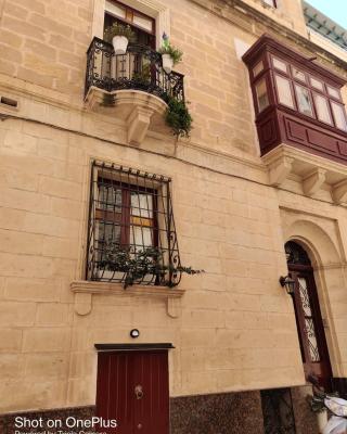 Semi-basement, cosy apartment interconnected to our residence a traditional Maltese townhouse