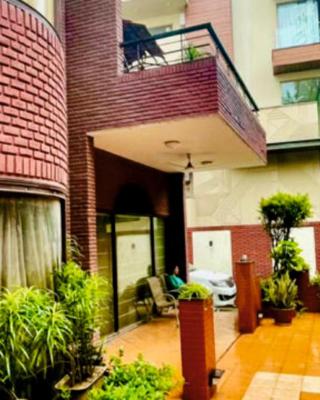 RED BRICK HOME BY EARTHAA ESCAPES