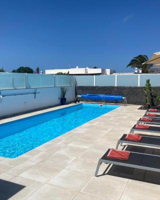 Villa Ashdene - luxury modern villa with large heated pool wifi uk tv bar & BBQ