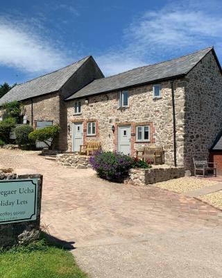 The Nook at Pentregaer Ucha, with tennis court & lake.