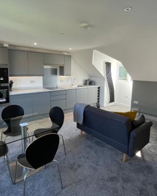 BH - Luxurious 1 bed top floor apartment with parking - please read about score