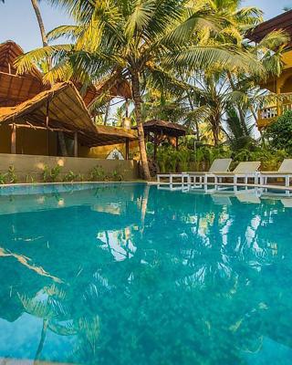 juSTa Morjim Beach Resort Goa - 80 Steps from Morjim Beach
