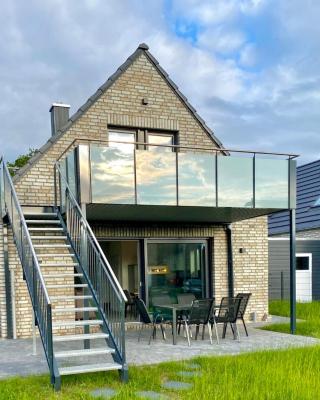 Ferienhaus Panoramadeck am Harkebrügger See mit Sauna und Kamin