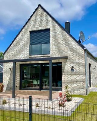 Ferienhaus Seestern am Harkebrügger See mit Sauna und Kamin