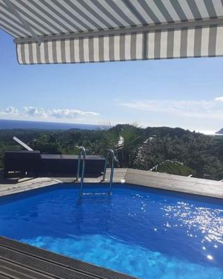 Chambre chez l'habitant avec piscine privative et vue panoramique sur la mer des caraïbes