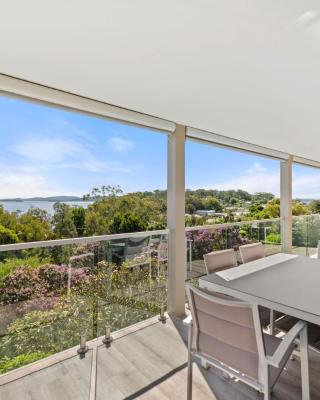 Family Retreat with water views at Corlette