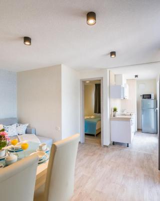 Holiday Home Sea side mobile home by Interhome