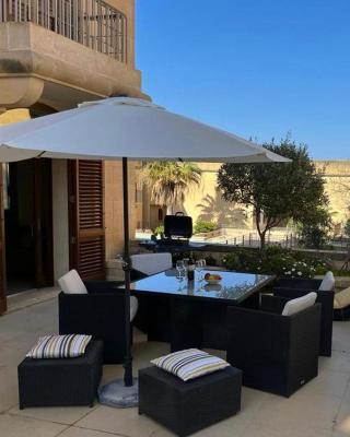 Poolside Luxury Apartment with Patio