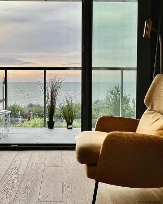 Tuż przy plaży - nowoczesny apartament z tarasem i pięknym widokiem na Bałtyk