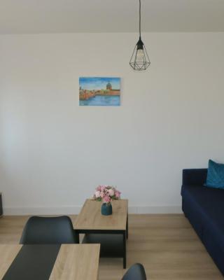 Appartement chaleureux et élégant en résidence.