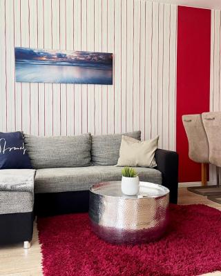 Strandliebe in Scharbeutz, stilvolle Ferienwohnung, 150m zum Strand! Sonnenbalkon, ruhig gelegen, kostenfreier Parkplatz, Fahrstuhl