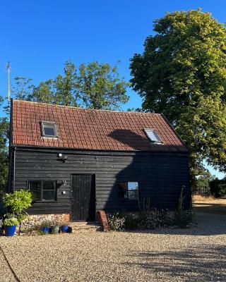 Gorgeous comfortable barn with huge private orchard in quiet Suffolk location