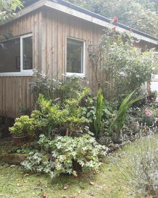 Tranquil wood cabin set in a beautiful orchard