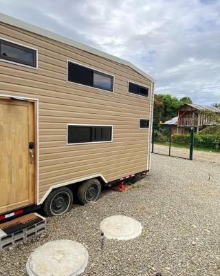 Tiny house with extended camping area for large groups