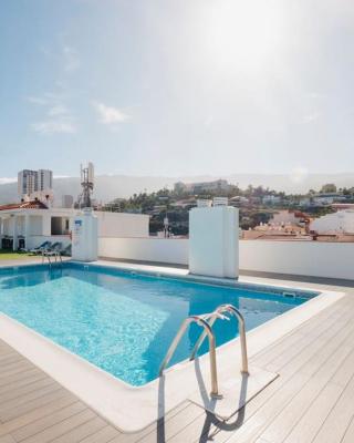 Studio with swimming pool and balcony