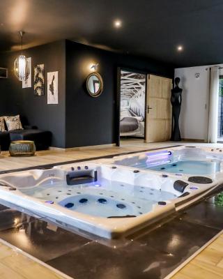 Au domaine des anges Gites avec Jacuzzi privatif dans la chambre