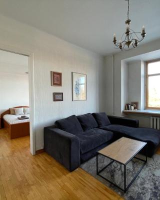 A cozy apartment with a wonderful view of the river in the old town of Vilnius