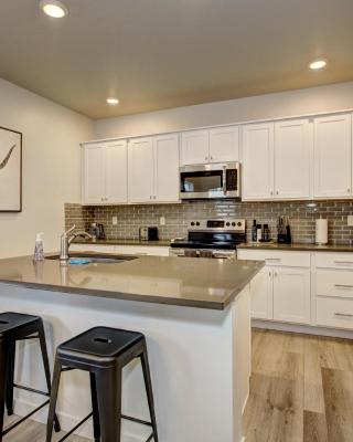 Hygee House Brand New Construction near Ford Idaho Center and I-84! Plush and lavish furniture, warm tones to off-set the new stainless appliances, play PingPong in the garage or basketball at the neighborhood park