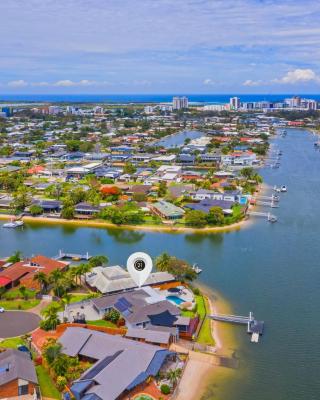 4 bedroom with large water frontage and pool, reverse air conditioning
