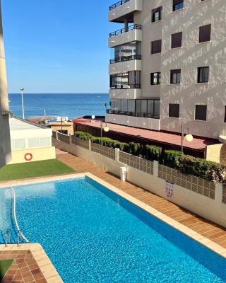 Apartment on the beach with parking and pool
