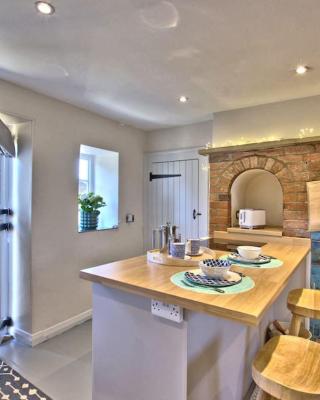 The Snug at Ruston, Cosy Dog Friendly Cottage