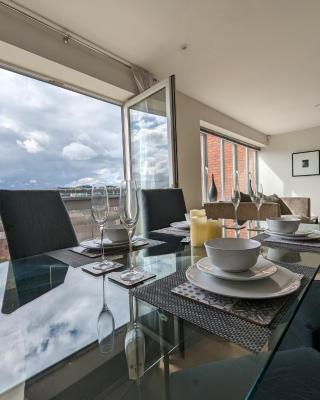 Quayside apartment with riverside views & parking