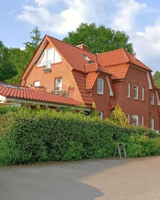 Moderne Ferienwohnung mit Kamin u Garten im EG 100qm Nähe Weser und Golfplatz