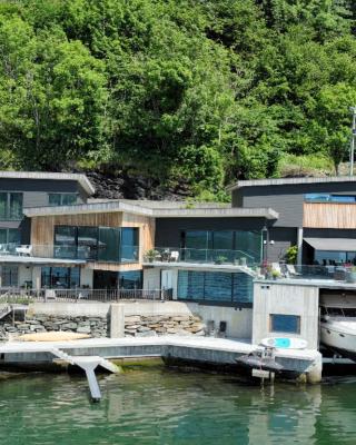 Panoramaresort in Hardangerfjorden With boat to rent - leilighet i sjøkanten ved Hardangerfjorden for 7 personer NEW sauna from desember 2023
