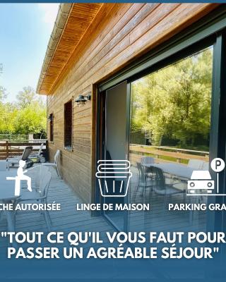 Chalet avec terrasse sur pilotis vue sur l'étang